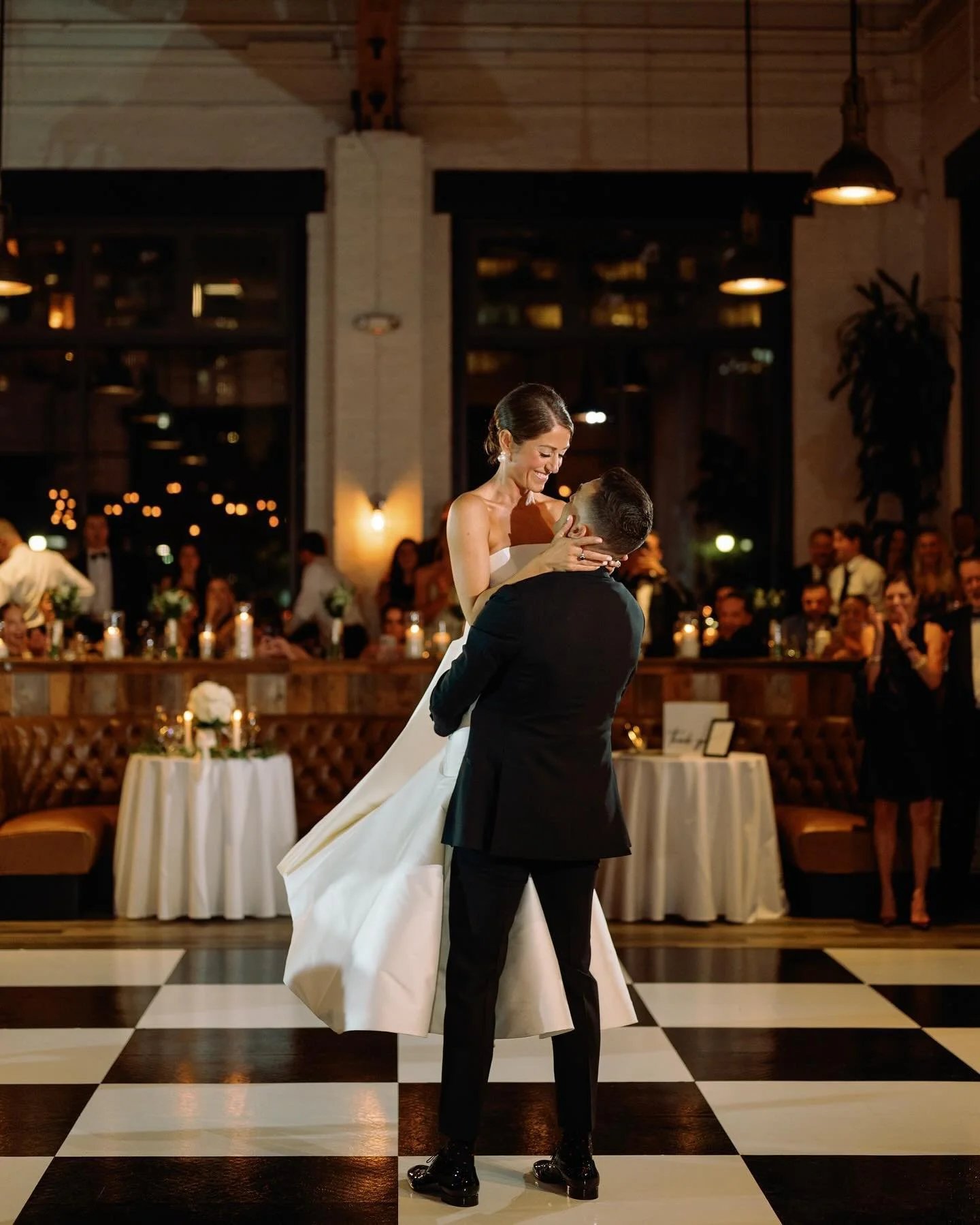 Dance floor set up under a sailcloth tent at an outdoor Los Angeles wedding reception