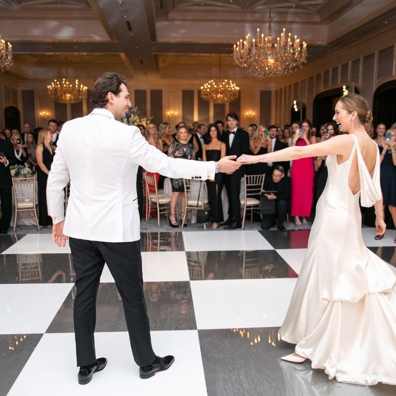 Custom dance floor set up in front of a live band at a Los Angeles wedding reception